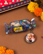 Load image into Gallery viewer, Sweet treats and scrunchie from silver Rakshabandhan hamper - Naman Arts