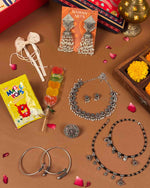 Load image into Gallery viewer, Rakhi Gift Hamper full contents flatlay - Naman Arts