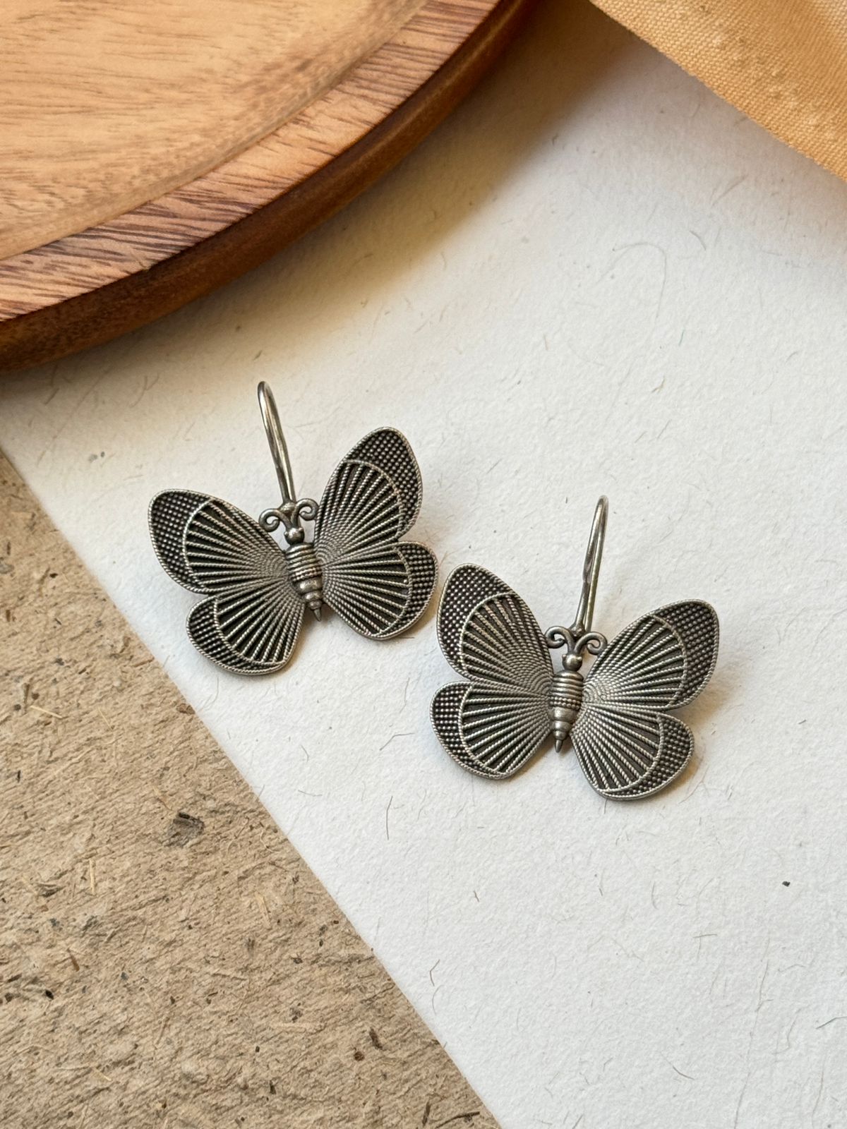 BUTTERFLY SILVER LOOKALIKE STUD EARRINGS
