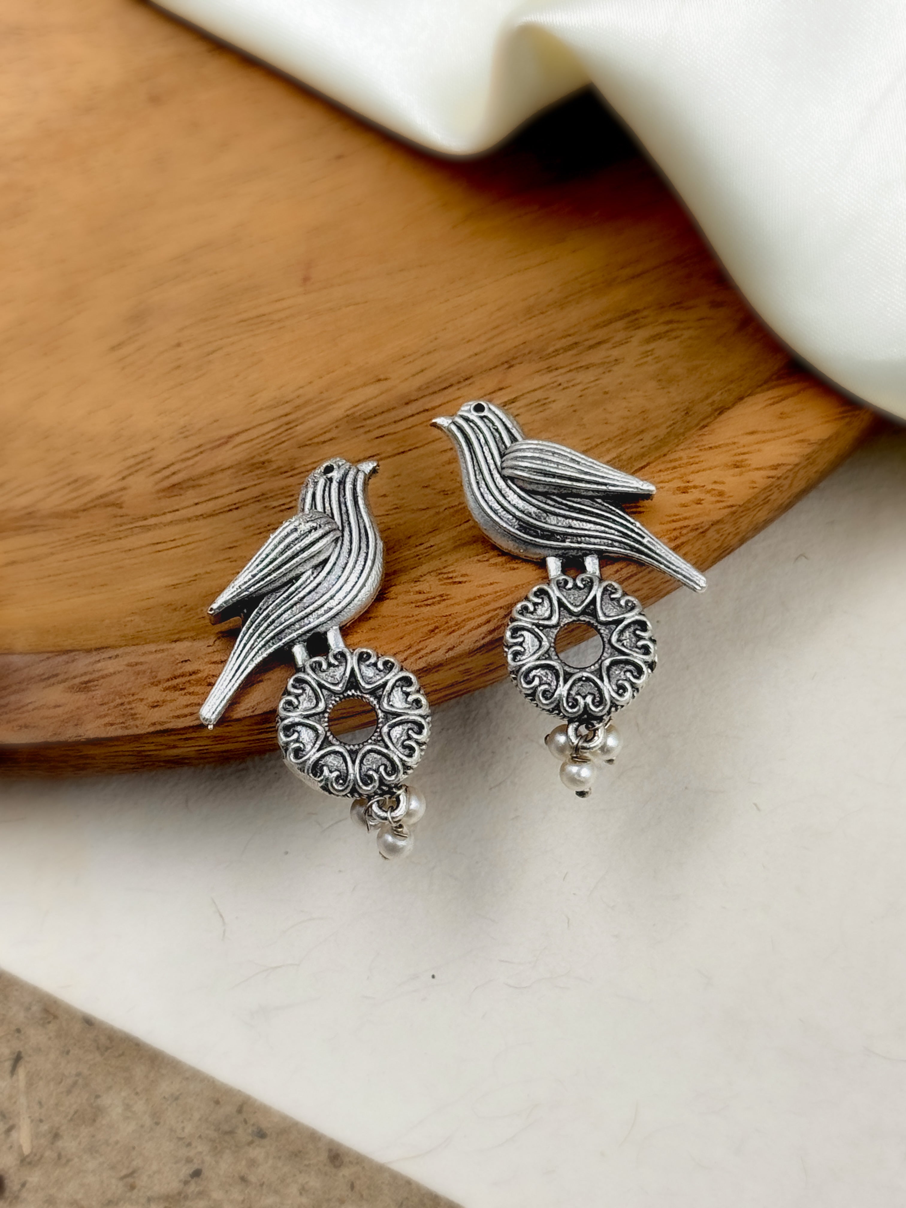 NEHA SILVER LOOKALIKE STUD EARRINGS