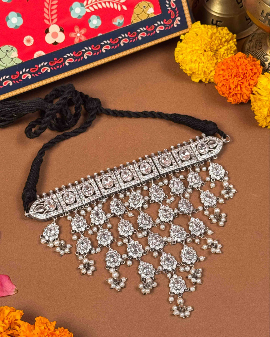Oxidised choker necklace set with floral motifs and stone embellishments - Naman Arts