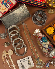 Premium Rakshabandhan gift hamper with oxidised clutch, necklace set and bangle stack - Naman Arts