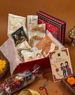 Load image into Gallery viewer, Golden Rakshabandhan hamper full contents flatlay - Naman Arts