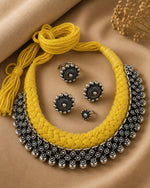 Load image into Gallery viewer, Traditional oxidised silver choker necklace set with yellow 
thread design, matching earrings, ring, and nose pin for ethnic wear.