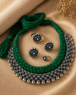 Load image into Gallery viewer, Traditional oxidised silver choker necklace set with green thread design, matching earrings, ring, and nose pin for ethnic wear.