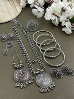 Load image into Gallery viewer, Oxidized jewelry set featuring two pendants of  Peacock design, a ring, earrings, kada, nosepin, and toe ring, all crafted in brass with intricate detailing.